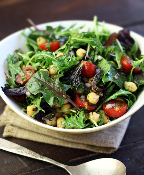 Chickpeas, cherry tomatoes and mixed leaves with lemon-cumin dressing