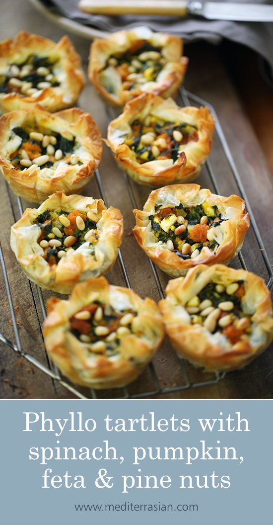 Phyllo tartlets with spinach, pumpkin, feta and pine nuts